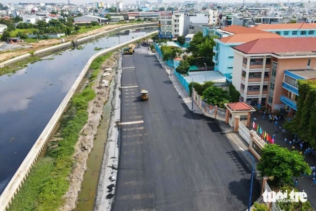 Nhà mặt tiền Tây Lân gần chợ, phù hợp vừa ở vừa kinh doanh.