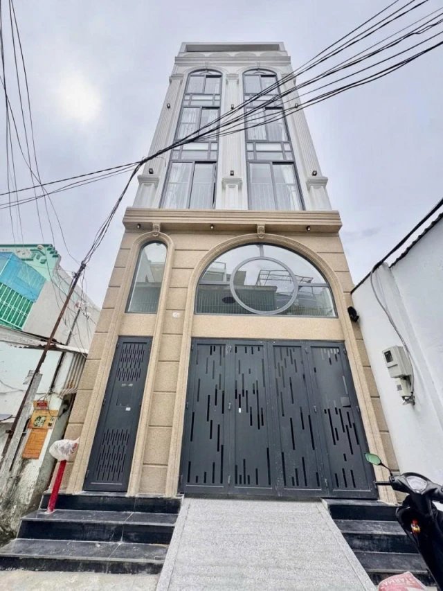 Bán tòa Nhà 6 Tầng -  Hẻm 6m Dương Quảng Hàm - 5x30m, 20 Homestay, HĐT 100Tr, 21 Tỷ.