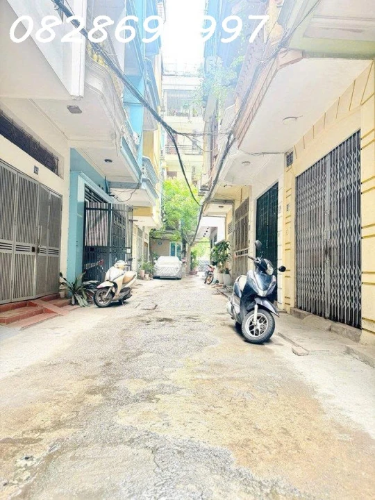 BÁN NHÀ NGUYỄN CHÍ THANH ĐỐNG ĐA PHÂN LÔ Ô TÔ DỪNG ĐỖ THANG MÁY 45M2 5 TẦNG 15 TỶ